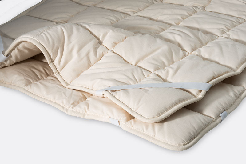 Schafschurwollauflage, gefüllt mit 700g/m² reinster Schafschurwolle, 100x200cm